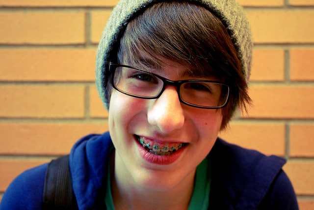 Trendy teenager smiling with braces