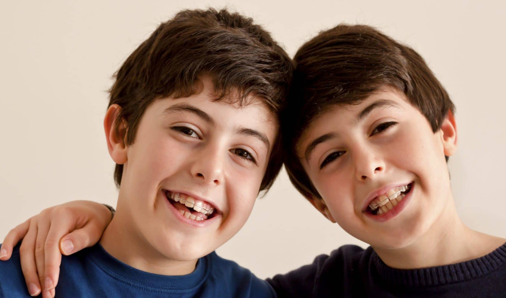 Photo of twins wearing braces
