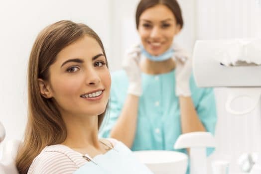 woman with braces in an Orthodontist's office